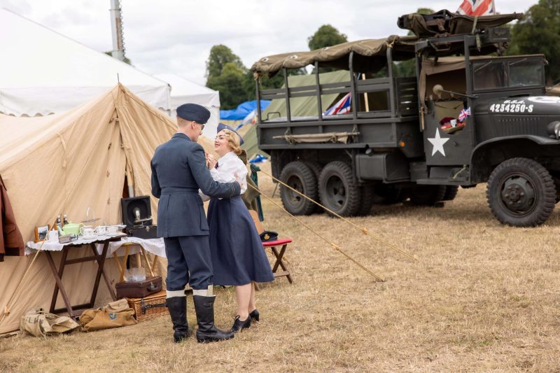 Couple in vintage military uniform dancing at Battle Proms event.